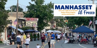 A photo of the street festival Manhasset Al Fresco, an event that promotes local businesses and outdoor dining, as well as live entertainment.