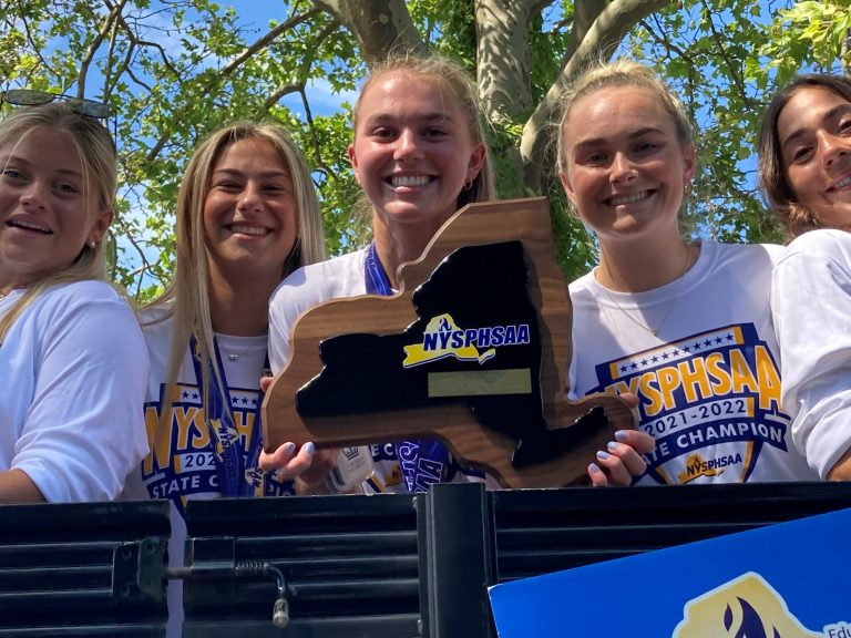 Manhasset state champion lacrosse teams honored with parade through town