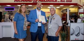 Nassau County Legislator Delia DeRiggi-Whitton (left), P.C. Richard & Sons Sales Director Joe Morrone (center), and Nassau County Veterans Service Agency Director Ralph Esposito (right).