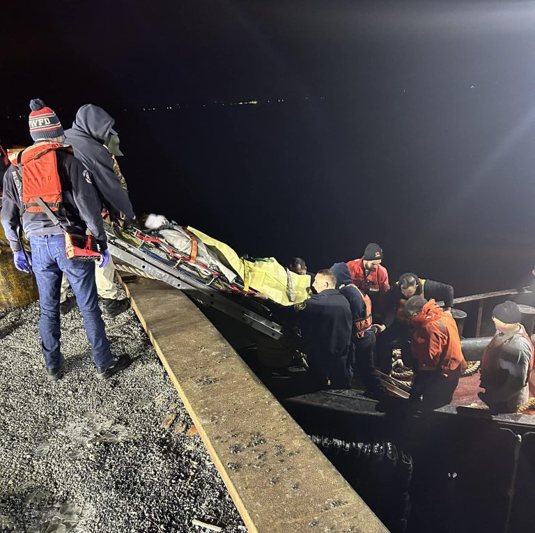 Port Washington Fire Department aids fallen barge worker