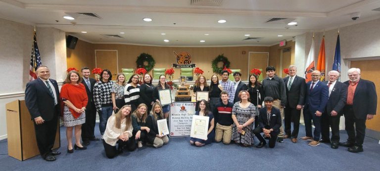 Mineola Marching Band honored by officials for undefeated season