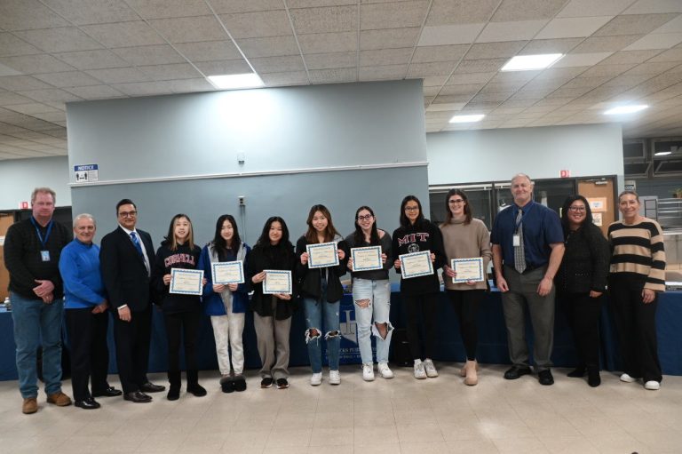 Herricks recognizes swim team at January board meeting