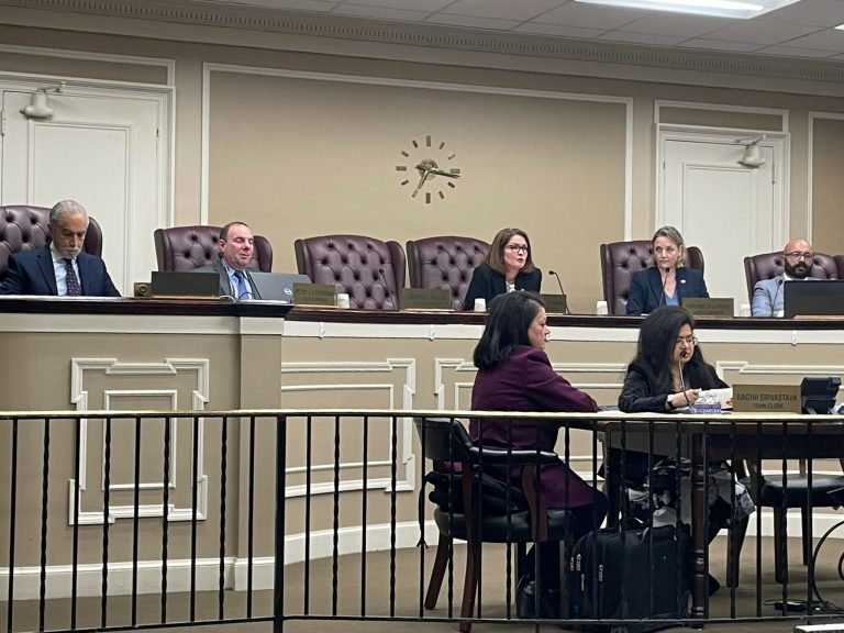 Hundreds of miles away, Santos dominates North Hempstead meeting Hundreds of miles away, Santos dominates North Hempstead meeting