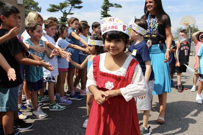 Harbor Hill hosts clap-in for first grade students