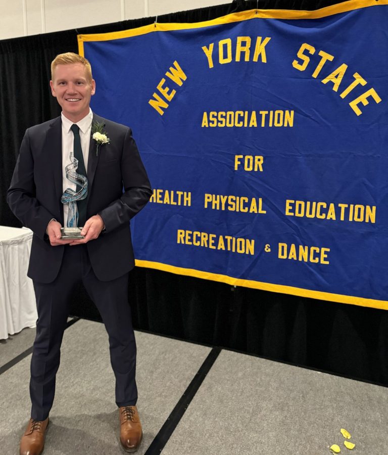 Sean Dooley, Port educator and Coach, secures top honors in educational and athletic excellence Sean Dooley, Port educator and Coach, secures top honors in educational and athletic excellence