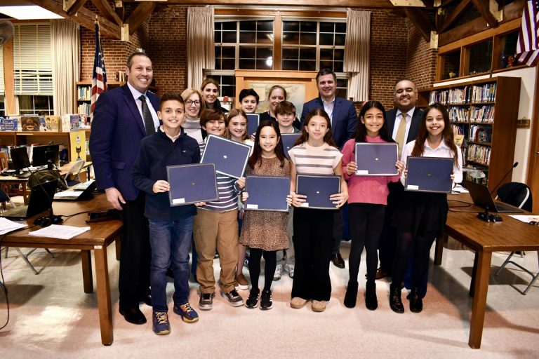 Manhasset Board of Education celebrates award-winning teacher and student ambassadors