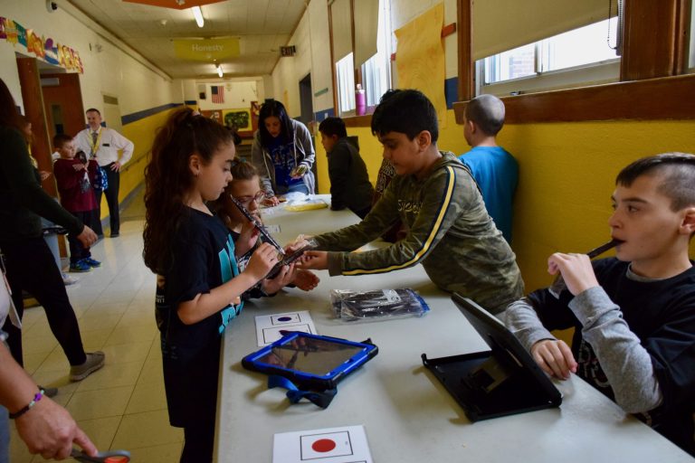 John Street School students sell ice pops to raise money for autism awareness