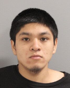 Nassau County man charged with illegally wearing a mask